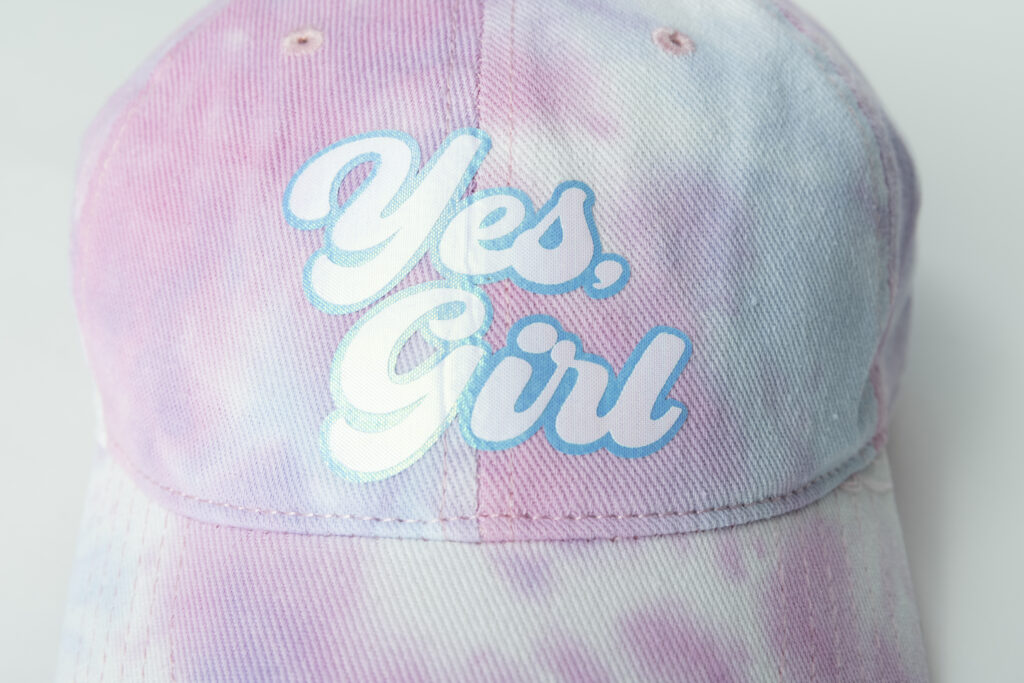 "Yes Girl" text in CAD-CUT Chroma-TWILL™ in White layered on top of CAD-CUT Chroma-TWILL™ in Sky Blue